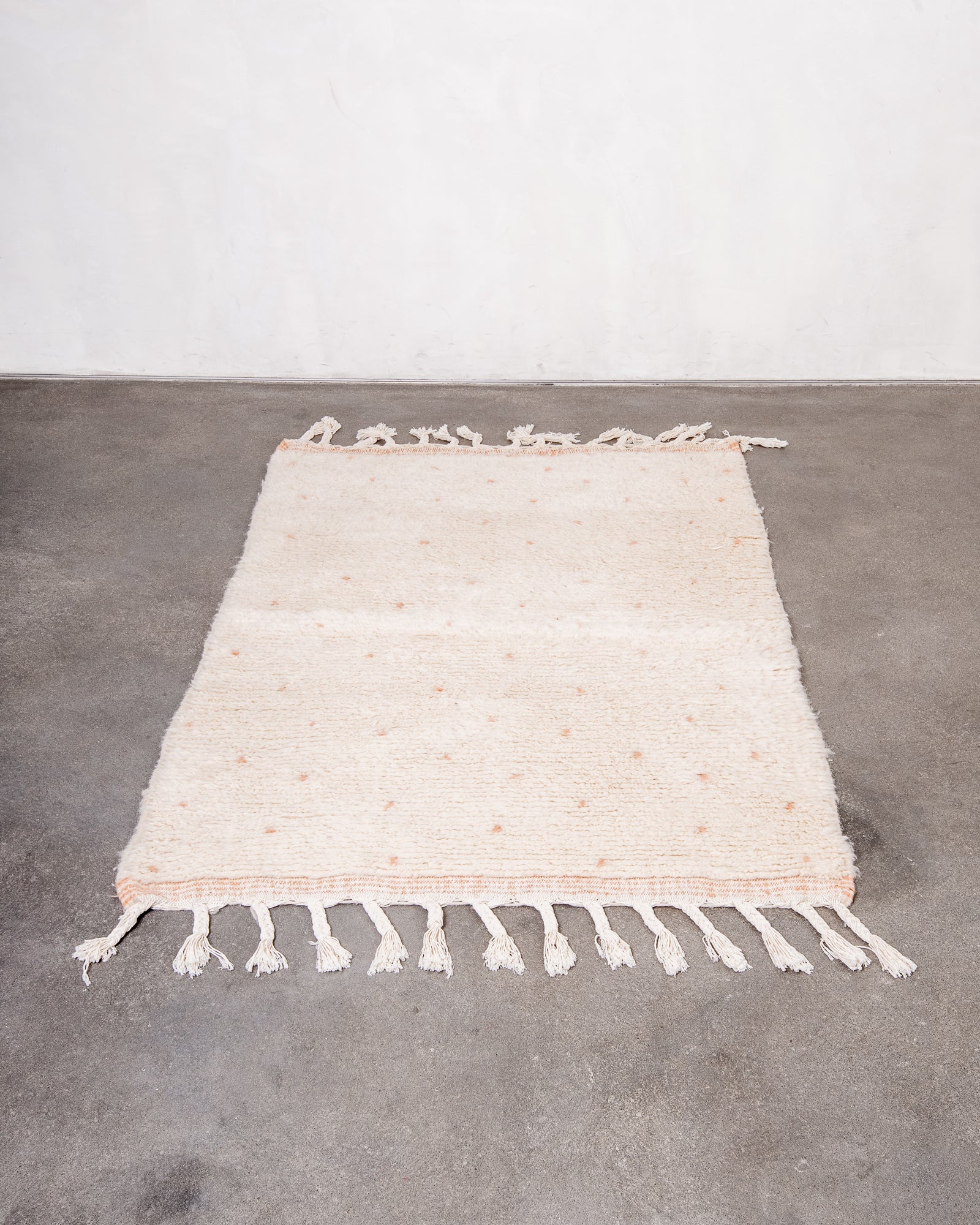 Modern, designer, handcrafted Berber rug from Morocco. Beniourain carpet with beautiful colours and patterns and fluffy wool texture.